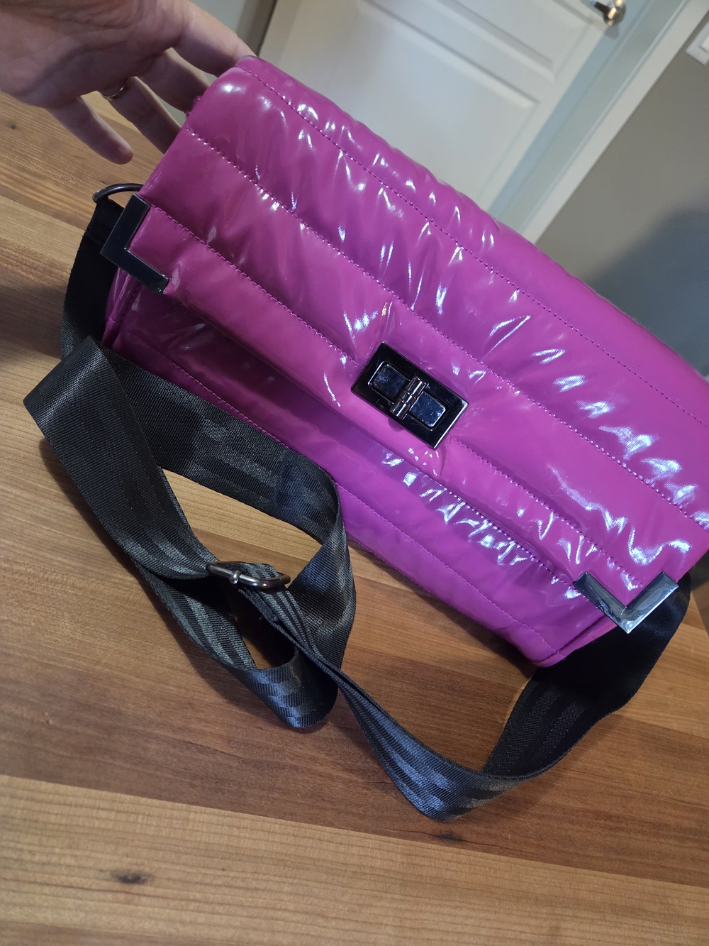 Think Royln Patent Fuchsia Margo Crossbody Bag.
